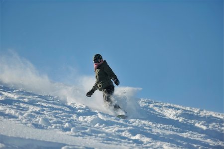 simsearch:400-05204614,k - freestyle snowboarder jump and ride free style  at sunny winter day on mountain Stock Photo - Budget Royalty-Free & Subscription, Code: 400-05204558