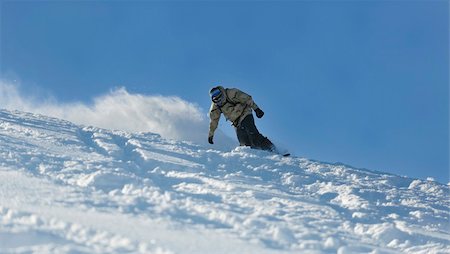 simsearch:400-04013574,k - freestyle snowboarder jump and ride free style  at sunny winter day on mountain Stock Photo - Budget Royalty-Free & Subscription, Code: 400-05204550
