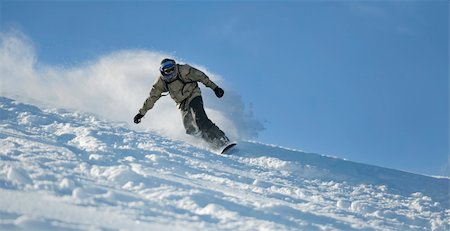 simsearch:400-05204614,k - freestyle snowboarder jump and ride free style  at sunny winter day on mountain Stock Photo - Budget Royalty-Free & Subscription, Code: 400-05204552