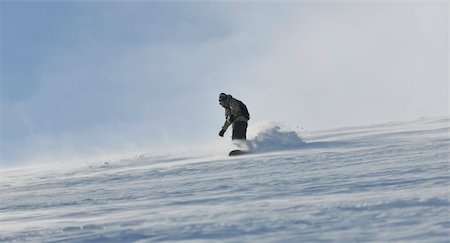 simsearch:400-05204614,k - freestyle snowboarder jump and ride free style  at sunny winter day on mountain Stock Photo - Budget Royalty-Free & Subscription, Code: 400-05204587