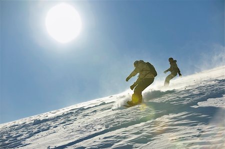 simsearch:400-04172843,k - freestyle snowboarder jump and ride free style  at sunny winter day on mountain Stock Photo - Budget Royalty-Free & Subscription, Code: 400-05204616