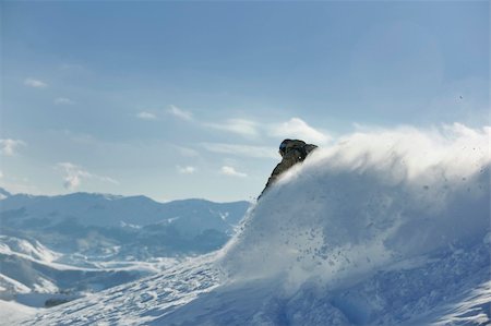 simsearch:400-05204614,k - freestyle snowboarder jump and ride free style  at sunny winter day on mountain Stock Photo - Budget Royalty-Free & Subscription, Code: 400-05204617