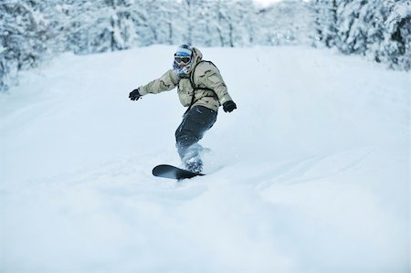 simsearch:400-04172843,k - freestyle snowboarder jump and ride free style  at sunny winter day on mountain Stock Photo - Budget Royalty-Free & Subscription, Code: 400-05204618