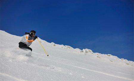 simsearch:400-04676217,k - skier free ride downhill at winter season on beautiful sunny day Stock Photo - Budget Royalty-Free & Subscription, Code: 400-05204707