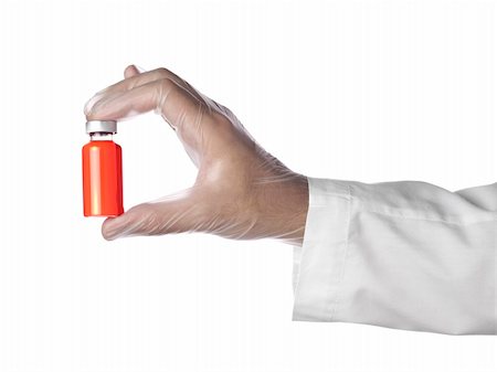 A doctor holds a vial full of red liquid with his latex gloves on. Isolated on white. Stock Photo - Budget Royalty-Free & Subscription, Code: 400-05205495