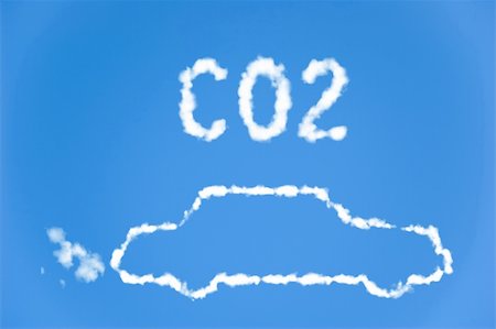 An illustration of a car with the text CO2 made up of white puffy clouds to represent environmental issues or carbon footprint. Fotografie stock - Microstock e Abbonamento, Codice: 400-05205642