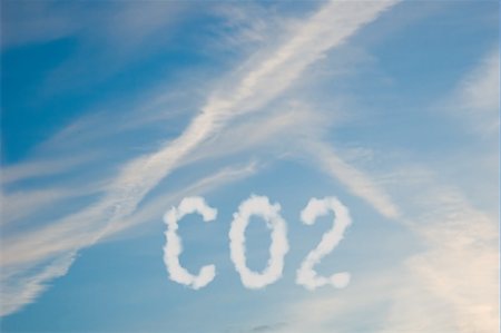 An illustration of the text CO2 made up of white puffy clouds to represent environmental issues or carbon footprint. Stock Photo - Budget Royalty-Free & Subscription, Code: 400-05205651