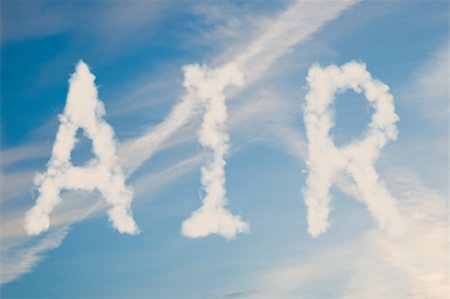 An illustration of the text air made up of white puffy clouds to represent environmental issues or carbon footprint. Stock Photo - Budget Royalty-Free & Subscription, Code: 400-05205652