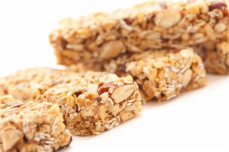 simsearch:700-02833202,k - Several Granola Bars Isolated on a White Background with Narrow Depth of Field. Photographie de stock - Aubaine LD & Abonnement, Code: 400-05205761