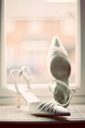 bride wedding heels in preperation Stock Photo - Budget Royalty-Free & Subscription, Code: 400-05205953