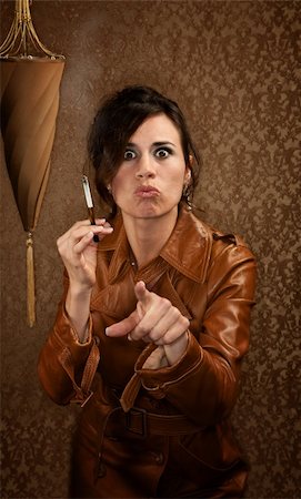 Woman in dark leather coat with cigarette Stock Photo - Budget Royalty-Free & Subscription, Code: 400-05206306