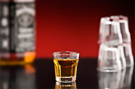 distillation whiskey - Shot of whiskey on a bar with bottle Stock Photo - Budget Royalty-Free & Subscription, Code: 400-05206358