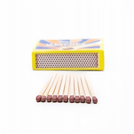 Matches unlit on a white surface Stock Photo - Budget Royalty-Free & Subscription, Code: 400-05206366