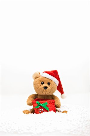 small teddybear sat in the snow, christmas decoration Foto de stock - Super Valor sin royalties y Suscripción, Código: 400-05206390