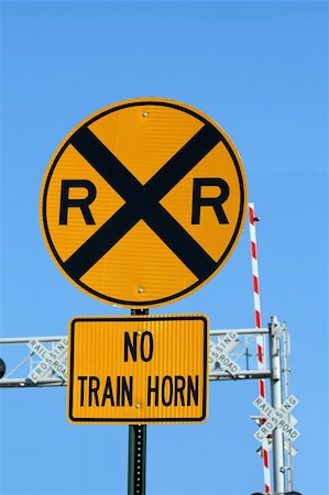 A Railroad crossing sign Stock Photo - Budget Royalty-Free & Subscription, Code: 400-05206659