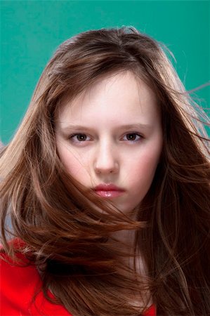 preteen beautiful face - studio shot of an eleven years old girl posing as a fashion model Stock Photo - Budget Royalty-Free & Subscription, Code: 400-05207679