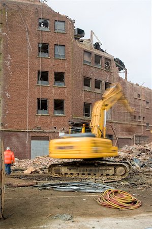 demolition squad destroy an old building to start a new development Stock Photo - Budget Royalty-Free & Subscription, Code: 400-05208285