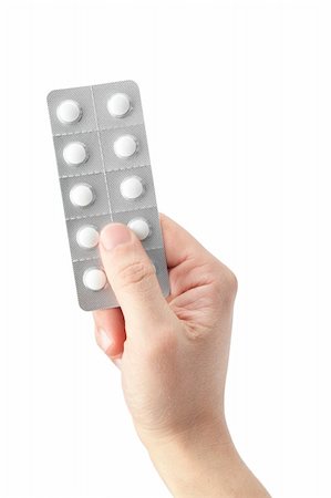 simsearch:400-04907865,k - pills in a hand on white background Photographie de stock - Aubaine LD & Abonnement, Code: 400-05208323