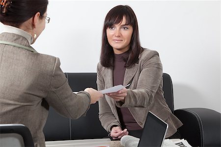 two business women having a meeting at the office Stock Photo - Budget Royalty-Free & Subscription, Code: 400-05208638