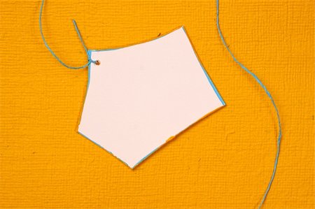 simsearch:400-07470440,k - Close up of handmade paper tag for background Stock Photo - Budget Royalty-Free & Subscription, Code: 400-05208947