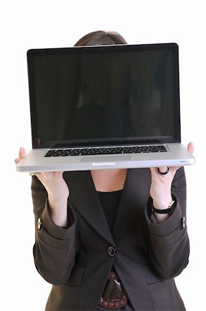 one young business woman isolated on white working on laptop computer Stock Photo - Budget Royalty-Free & Subscription, Code: 400-05209694