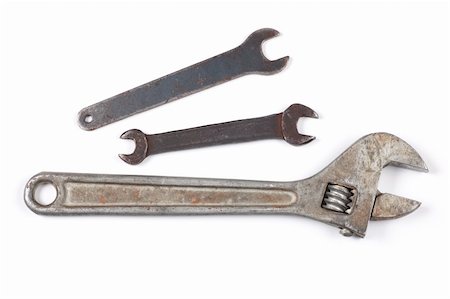 simsearch:400-05208356,k - Old rusty wrench isolated on a white background shadow below. Foto de stock - Super Valor sin royalties y Suscripción, Código: 400-05209998