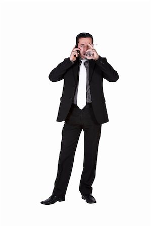 Isolated businessman celebrating with a glass of drink and a cigarette while talking on the phone Foto de stock - Super Valor sin royalties y Suscripción, Código: 400-05200007