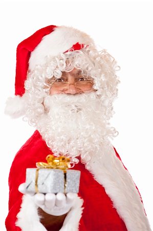 surprised old man with a beard - Closeup of old happy Santa Claus holding a Christmas present in his hand. Isolated on white. Stock Photo - Budget Royalty-Free & Subscription, Code: 400-05200072