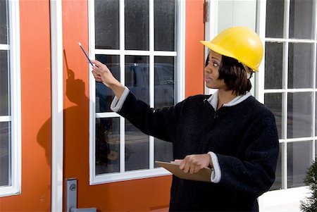 simsearch:400-04288994,k - A female construction worker inspecting a building Photographie de stock - Aubaine LD & Abonnement, Code: 400-05200783