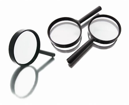 simsearch:400-04996978,k - Magnifying Glasses with Reflection on White Background Photographie de stock - Aubaine LD & Abonnement, Code: 400-05200882
