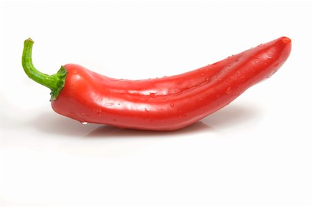 simsearch:400-04697254,k - close-up on a fresh chili pepper, isolated on white, copy space Foto de stock - Super Valor sin royalties y Suscripción, Código: 400-05201833