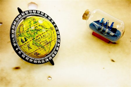 Globe and bottle with ship grunge background Stock Photo - Budget Royalty-Free & Subscription, Code: 400-05202302