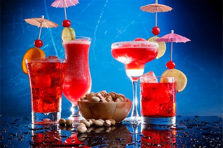 Strawberry Marfarita and daiquiri, cosmopolitan on the roks and Grenadine Fizz with pistachio Stock Photo - Budget Royalty-Free & Subscription, Code: 400-05202336