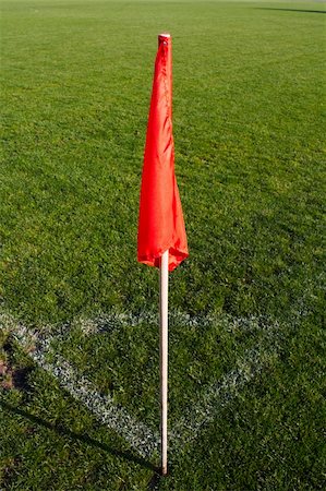 simsearch:400-06769903,k - Red corner flag on an soccer field. Photographie de stock - Aubaine LD & Abonnement, Code: 400-05202496