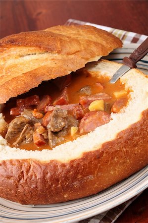 stew sausage - Goulash soup with beef, potato and meat sausage, served in a bread bowl Stock Photo - Budget Royalty-Free & Subscription, Code: 400-05203265