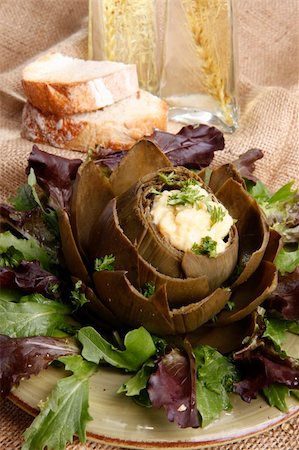 Steamed Artichoke stuffed with Hollandaise sauce Stock Photo - Budget Royalty-Free & Subscription, Code: 400-05203349