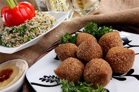 Fried Kibbe, Tabouli and Hummus Tahine Stock Photo - Budget Royalty-Free & Subscription, Code: 400-05203355