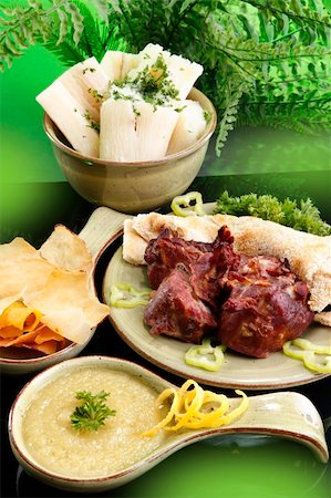 Game barbecue,  Cassava in garlic, butter, Yuca chips, soak and bake cassava bread and yuca with cheese dip Fotografie stock - Microstock e Abbonamento, Codice: 400-05203370