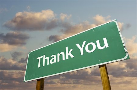 simsearch:400-04691775,k - Left Facing Thank You Green Road Sign Over Dramatic Clouds and Sky. Stockbilder - Microstock & Abonnement, Bildnummer: 400-05203534