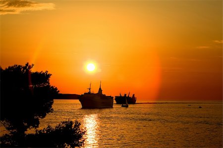 simsearch:400-06101259,k - Boats in the sunset of the coast of Croatia. Fotografie stock - Microstock e Abbonamento, Codice: 400-05203581