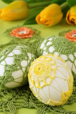 simsearch:400-04291976,k - Easter eggs with beautiful yellow and green crochet decoration and tulips Photographie de stock - Aubaine LD & Abonnement, Code: 400-05203666