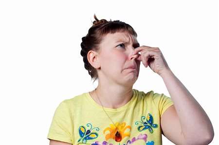 simsearch:400-05213670,k - Woman pinches her nose, bad smells in the air Stock Photo - Budget Royalty-Free & Subscription, Code: 400-05214022