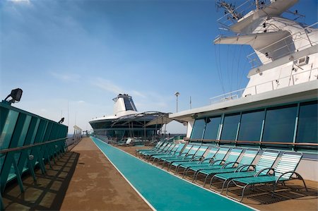 deck chair railing - top deck of cruise ship Stock Photo - Budget Royalty-Free & Subscription, Code: 400-05214174