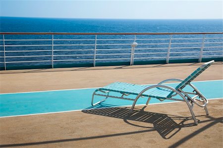 deck chair railing - top deck of cruise ship Stock Photo - Budget Royalty-Free & Subscription, Code: 400-05214175
