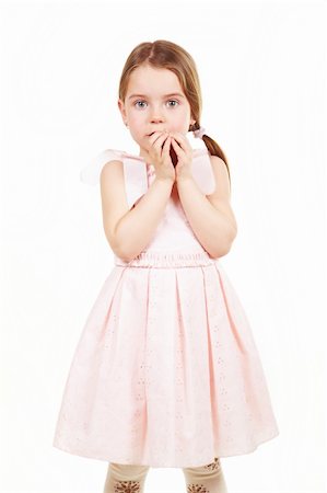 Shy little girl in pink cute dress Stock Photo - Budget Royalty-Free & Subscription, Code: 400-05214611