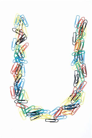 simsearch:400-06070388,k - Letter U formed with colorful paperclips Photographie de stock - Aubaine LD & Abonnement, Code: 400-05215800