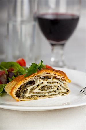strudel - spinach strudel with fresh salad Stock Photo - Budget Royalty-Free & Subscription, Code: 400-05215815