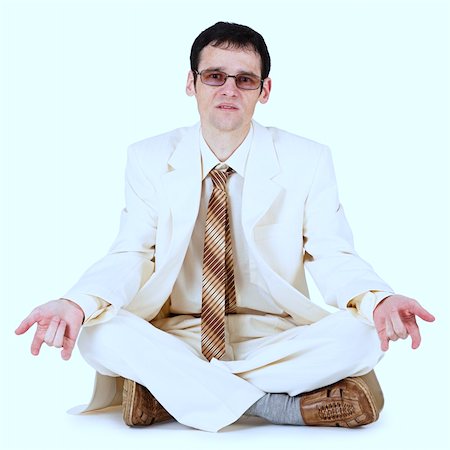 suits foot - Cool guy in white suit sitting on a white background Foto de stock - Super Valor sin royalties y Suscripción, Código: 400-05215912