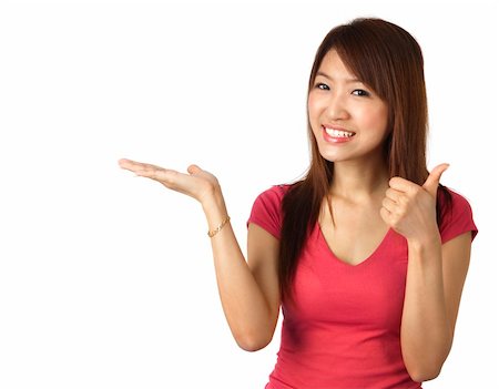 simsearch:400-06142860,k - Close-up of a young Asian woman gesturing Fotografie stock - Microstock e Abbonamento, Codice: 400-05216802