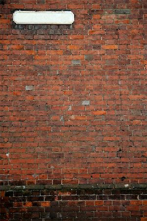 donsimon (artist) - vintage blank white street sign with no text on old brick wall rye in england Foto de stock - Super Valor sin royalties y Suscripción, Código: 400-05217668